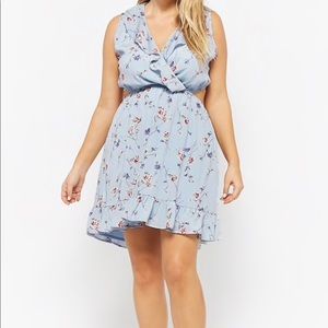 Mini blue dress with flattering opening in back